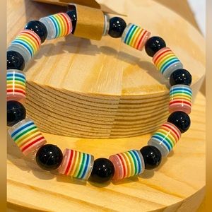 Bracelet-Rainbow Love, plastic rainbow themed beads with black accent beads 7.5”